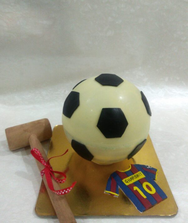 Football Pinata Cake With Hammer