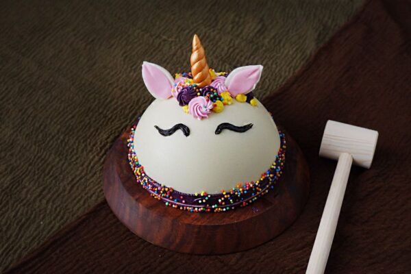 Unicorn Pinata Cake With Hammer